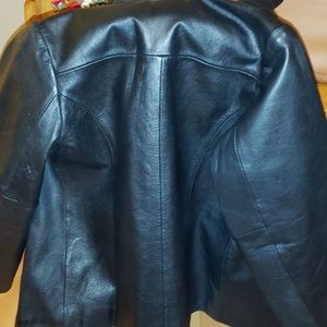 Slightly worn leather Coat